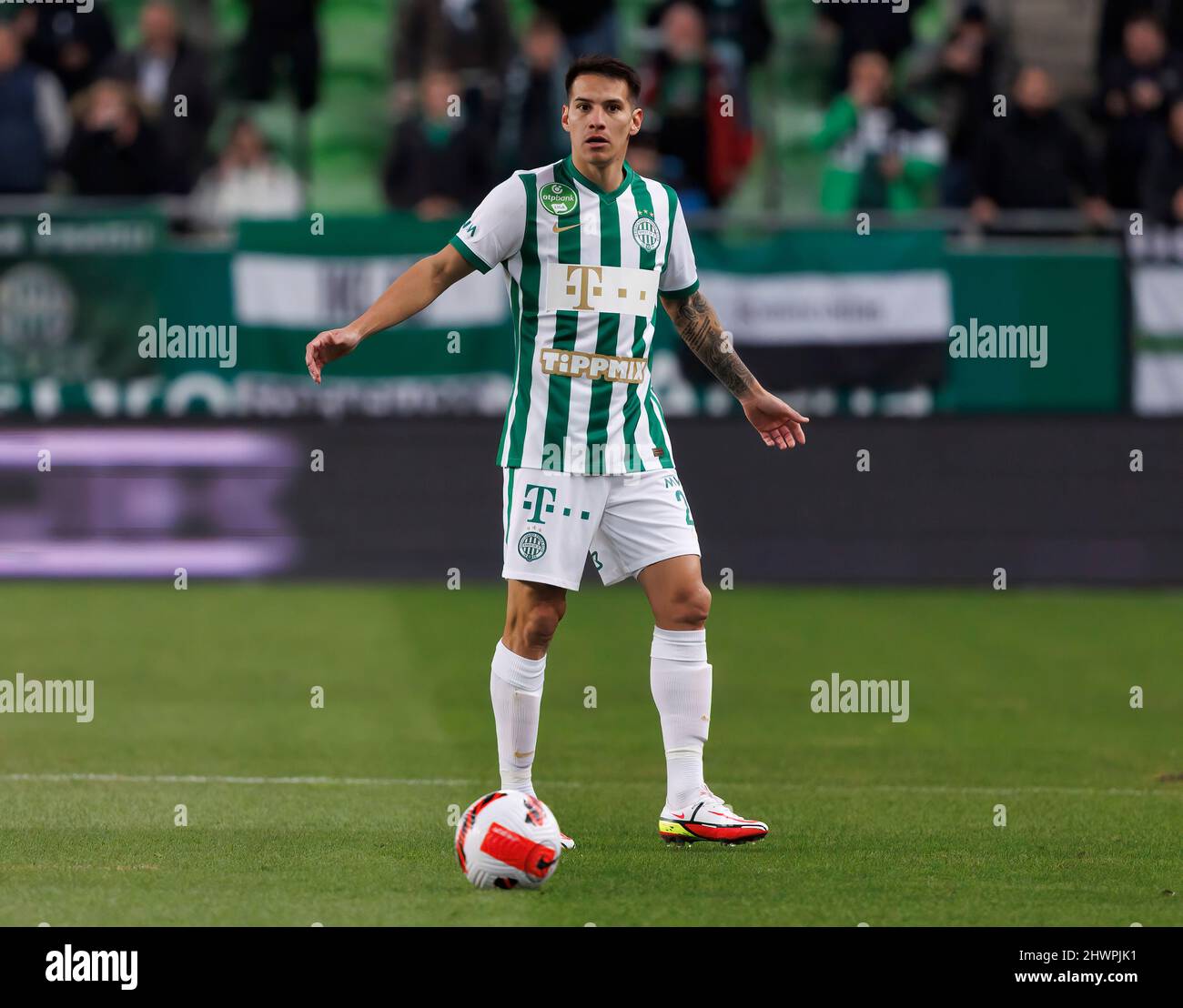 BUDAPEST, HUNGARY - MARCH 6: Claudiu Bumba of Kisvarda Master Good  challenges Henry Wingo of Ferencvarosi TC during the Hungarian OTP Bank  Liga match between Ferencvarosi TC and Kisvarda Master Good at