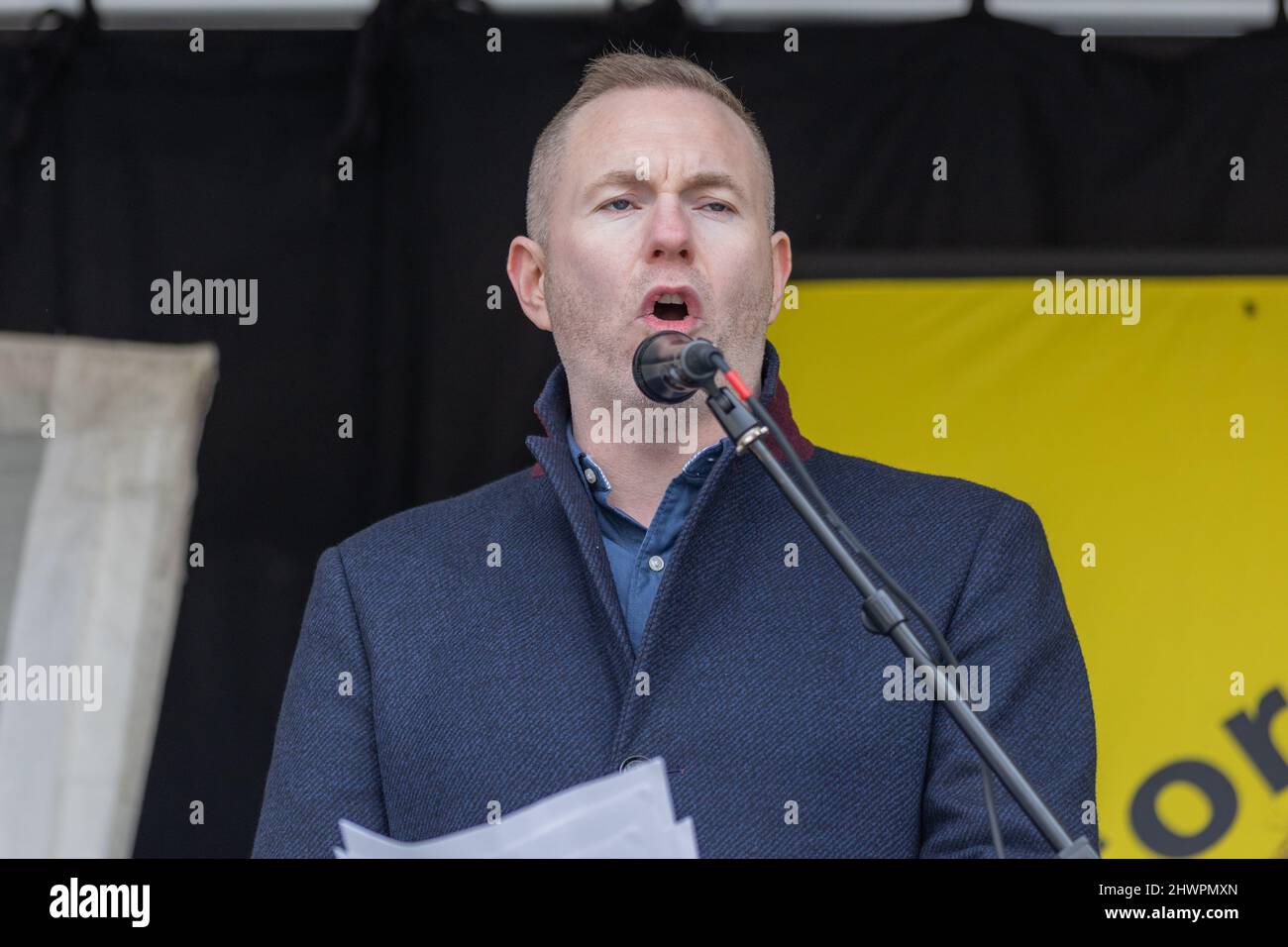 Sinn Féin MP for South Down Chris Hazzard speaks at a Stop the War Stop NATO expansion rally, Trafalgar Square, London, 6th Mar, 2022 Stock Photo