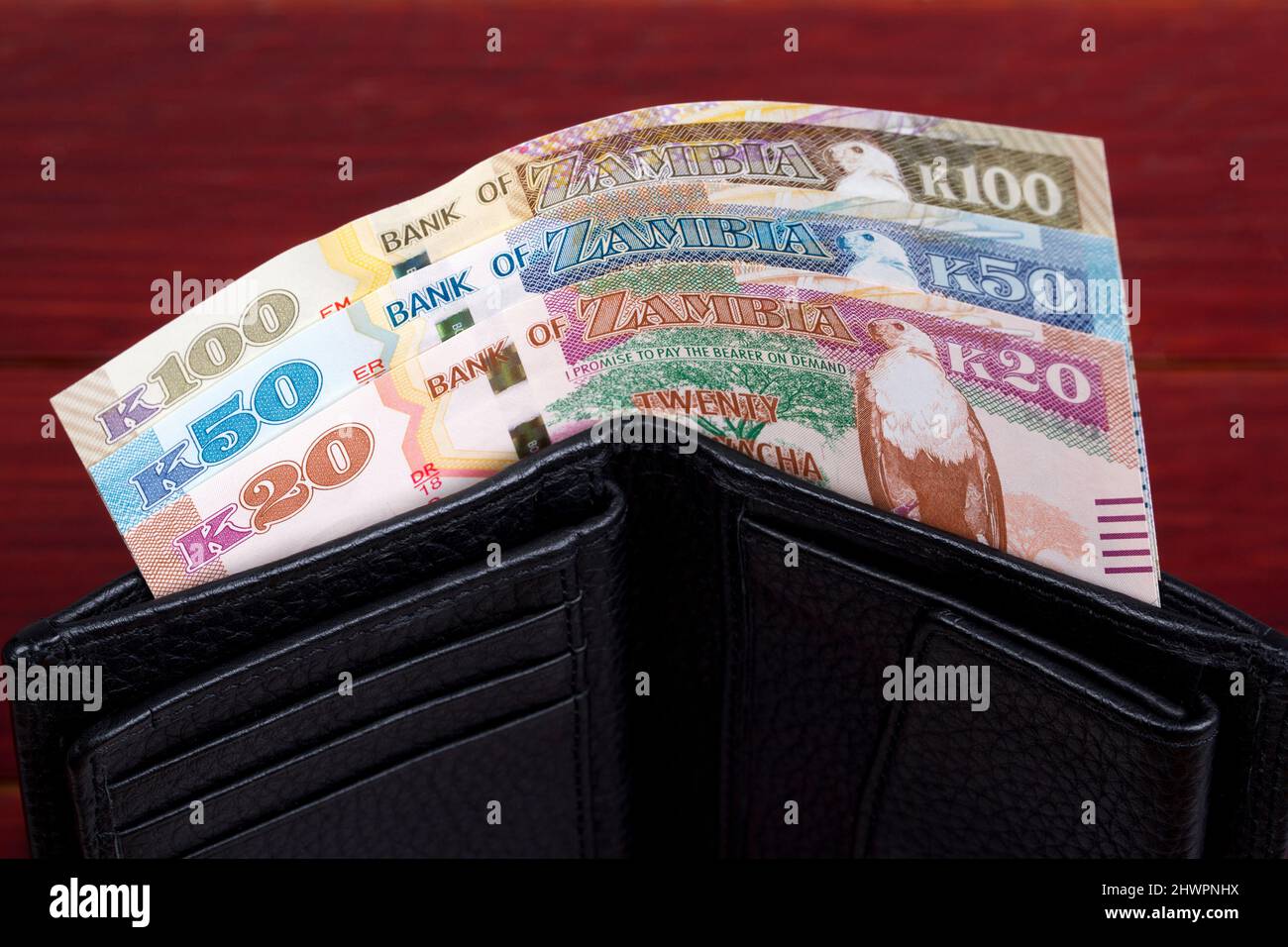 Zambian money kwacha in the black wallet Stock Photo Alamy
