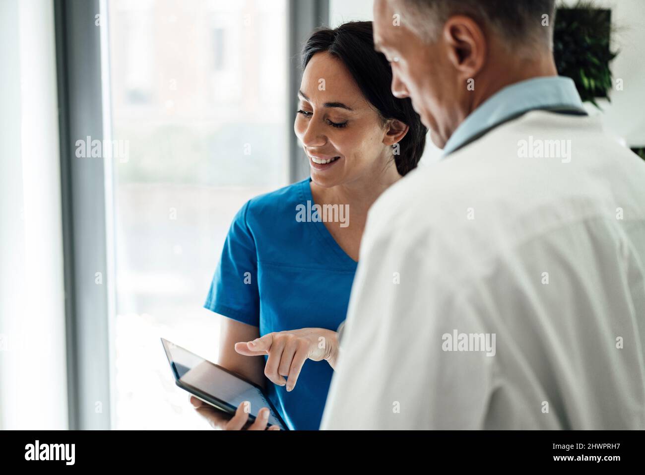Doctor nurse looking documents hi-res stock photography and images - Alamy