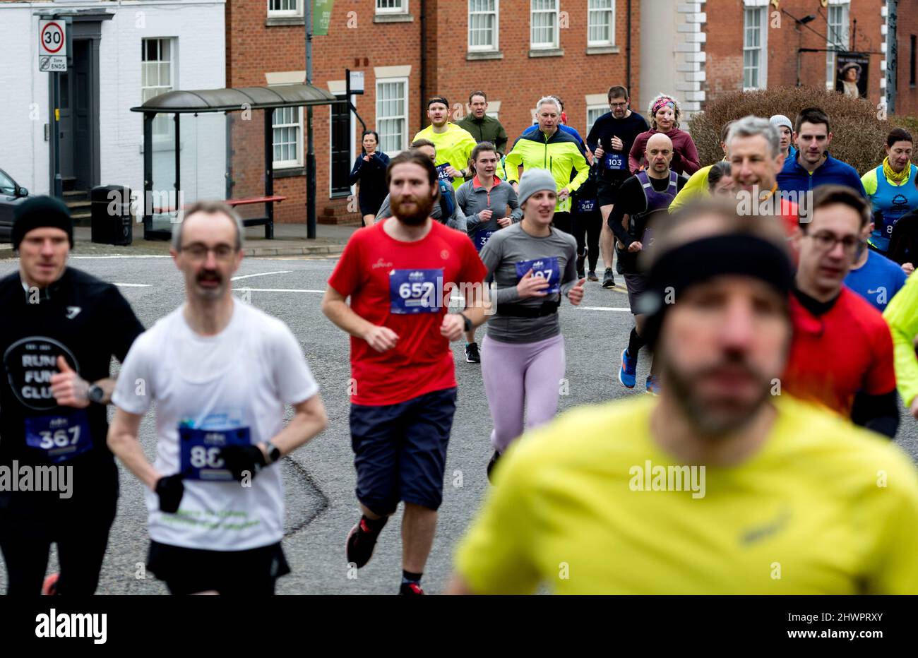 Runners in the 2022 Warwick Half Marathon, Warwickshire, UK Stock Photo ...