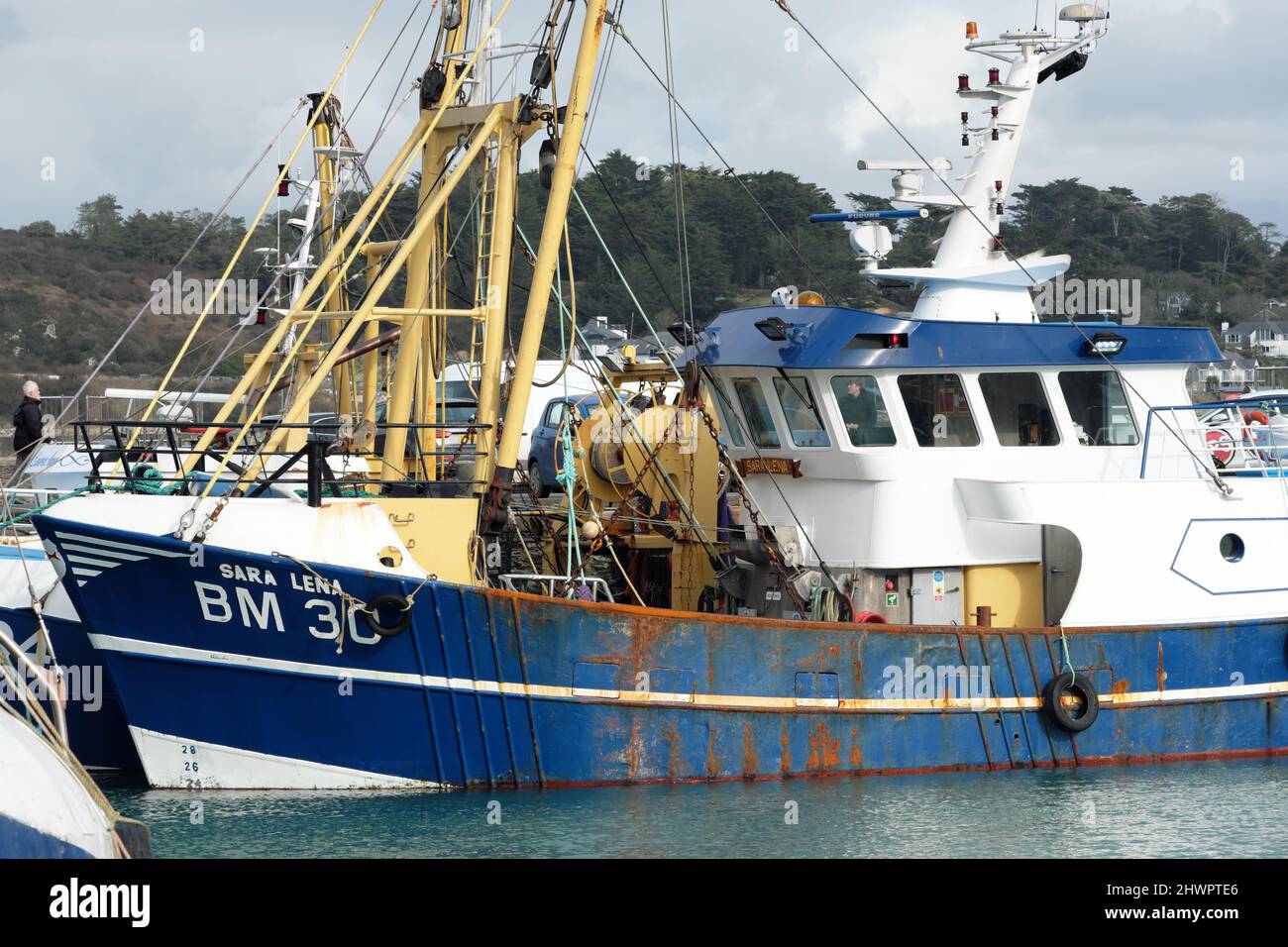 Padstow Cornwall UK fishing boats moored in the harbour - shown here BM 30 Sara Lena a trawler from Brixham Stock Photo