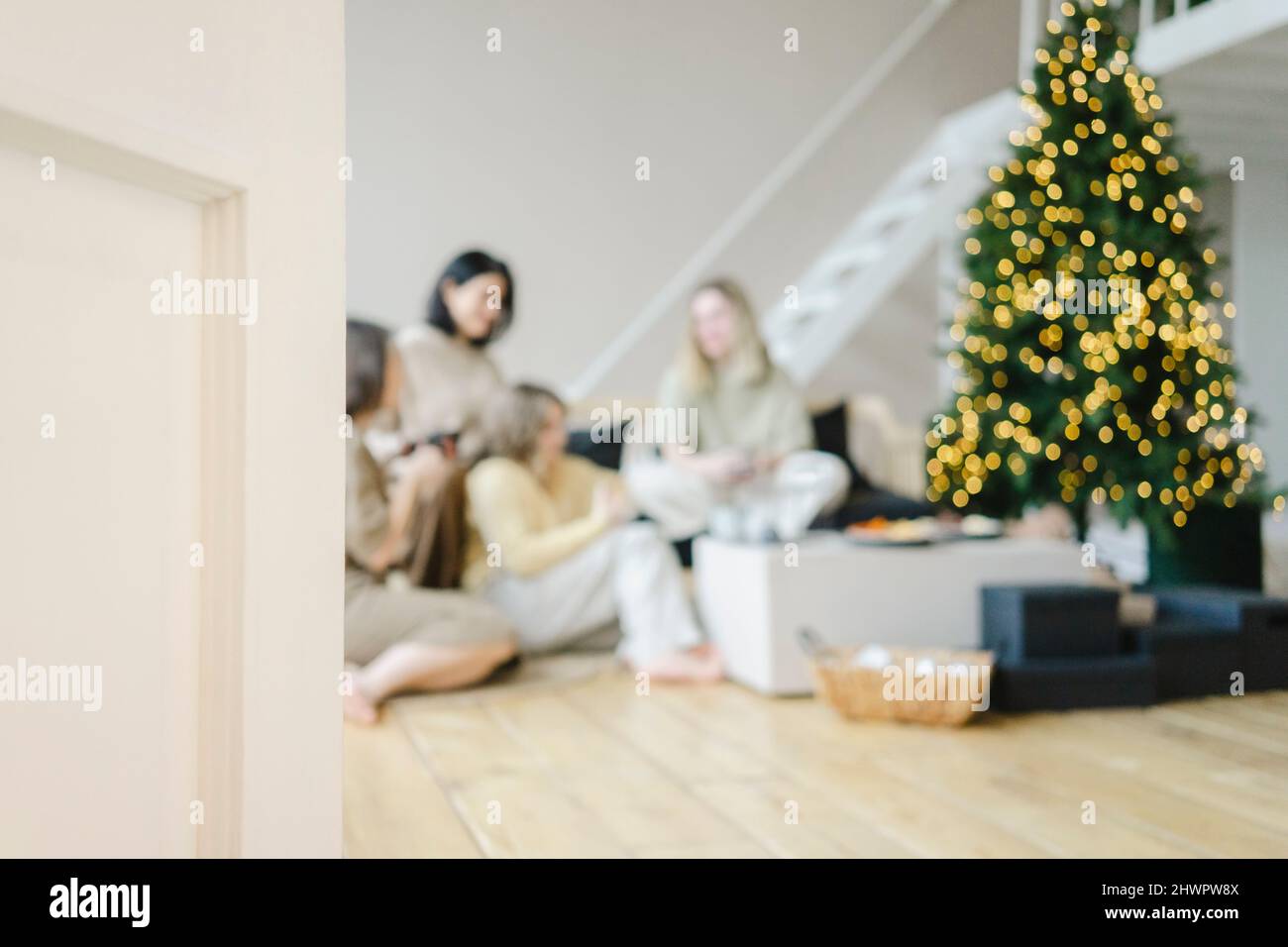 Mothers and daughters in living room at Christmas vacation Stock Photo