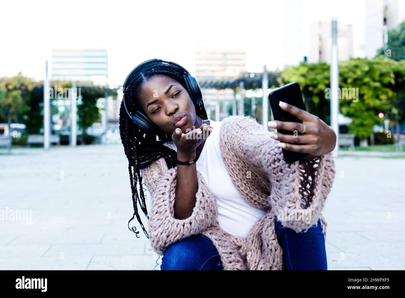 Corn Rows Stock Image Woman braids blowing kiss hi-res stock photography and images - Alamy