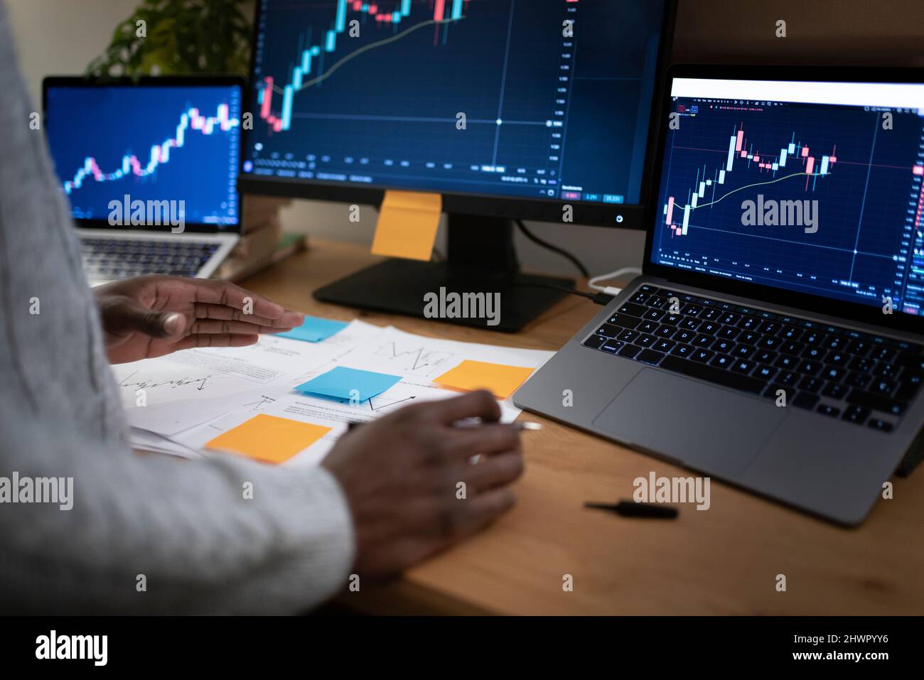 Young businessman trading cryptocurrency late night at home office Stock  Photo - Alamy