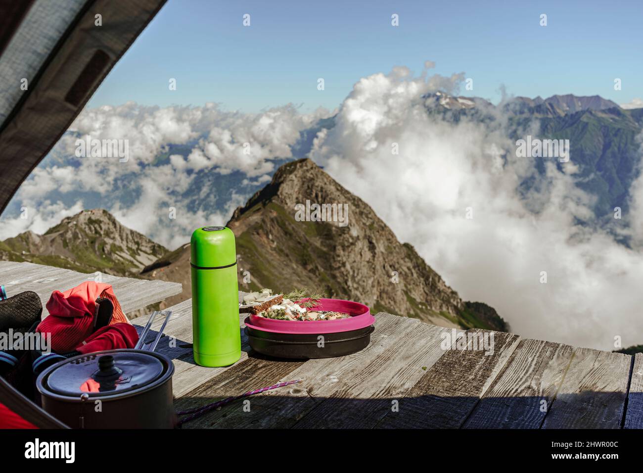 Meal on floorboard outside tent at Caucasus Nature Reserve, Sochi, Russia Stock Photo