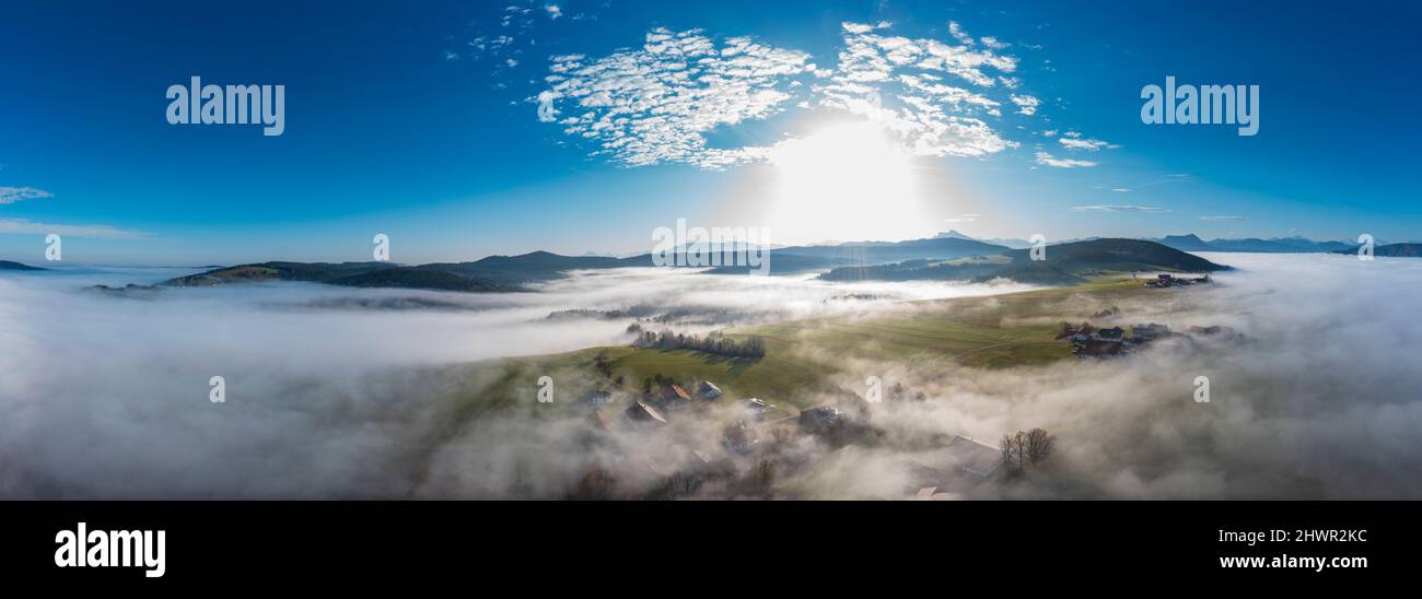 Drone panorama of agricultural fields at foggy sunrise Stock Photo