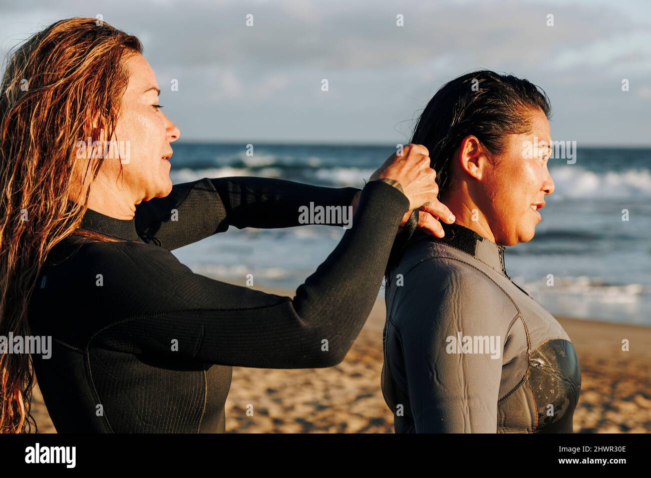 Asian woman surfer wetsuit hires stock photography and images Alamy