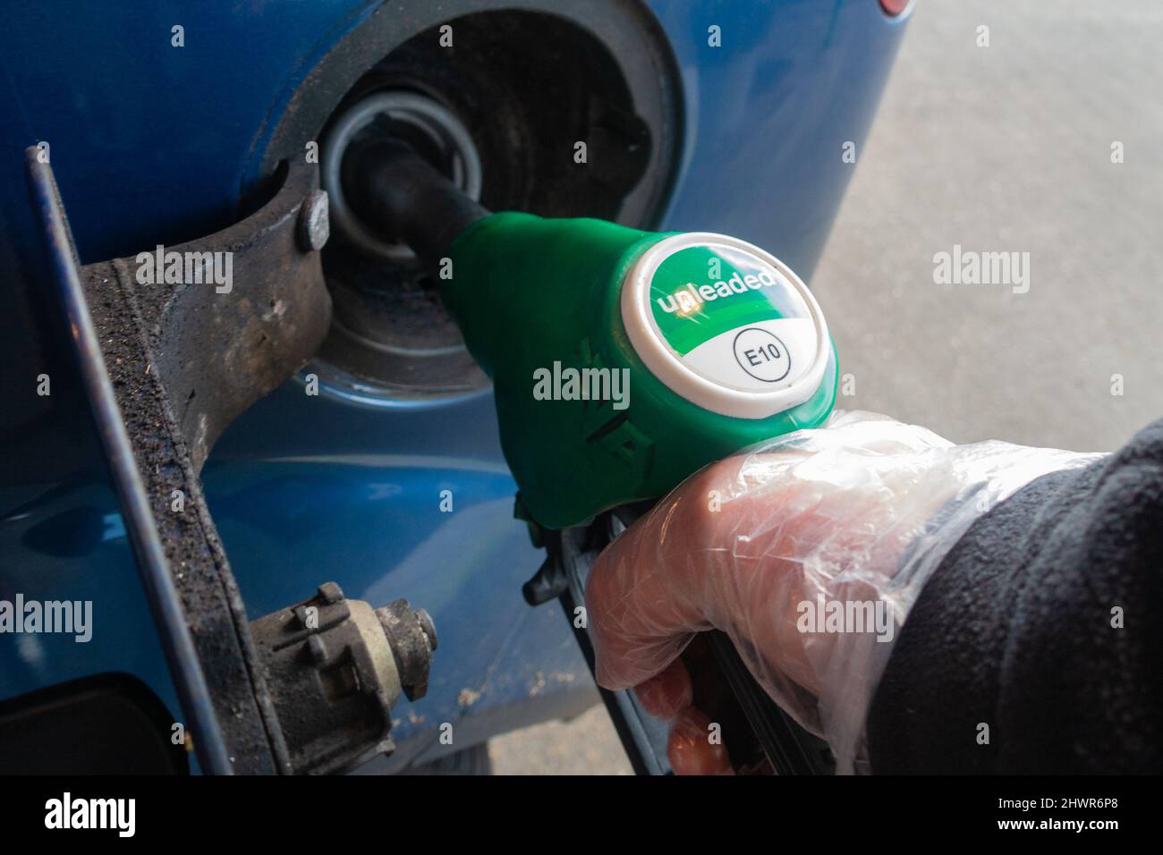 Ashford, Kent, UK. 7th Mar, 2022. A petrol station in Ashford, Kent is now charging over £1.67 per litre of diesel as a barrel of oil hits $130. A man fills up his car with E10 unleaded fuel. Photo Credit: Paul Lawrenson-PAL News/Alamy Live News Stock Photo