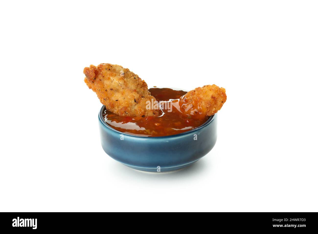 Chicken strips in sauce isolated on white background Stock Photo Alamy