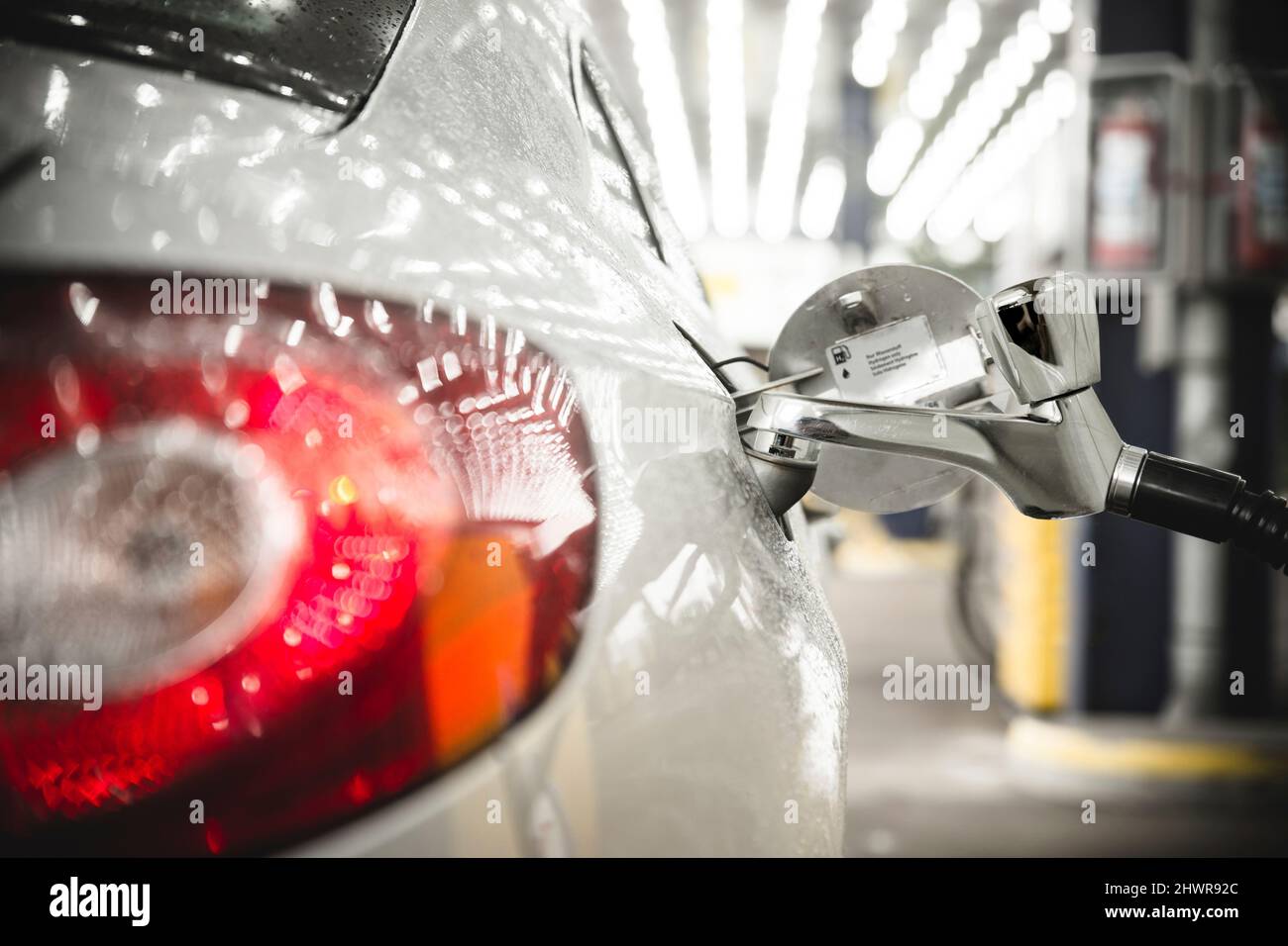 Refuelling of modern hydrogen-fueled car Stock Photo