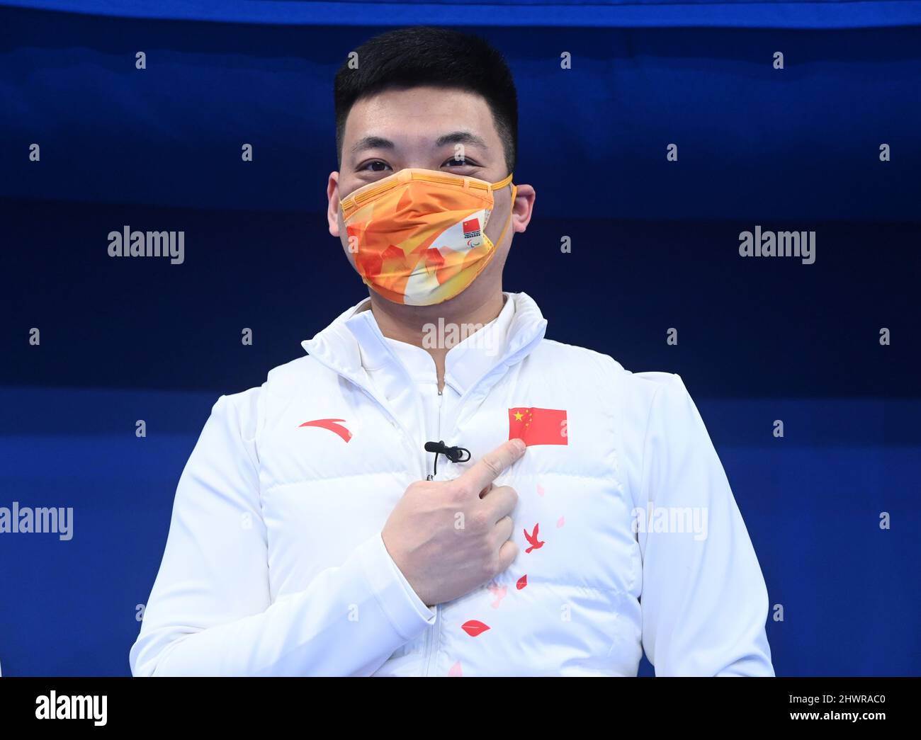 Beijing, China. 7th Mar, 2022. Zhang Mingliang of China reacts before ...