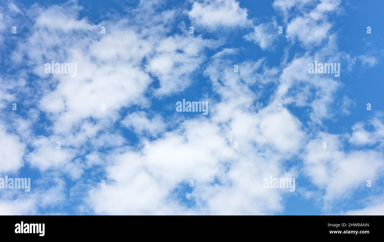 Blue sky with clouds - background with copy space Stock Photo - Alamy