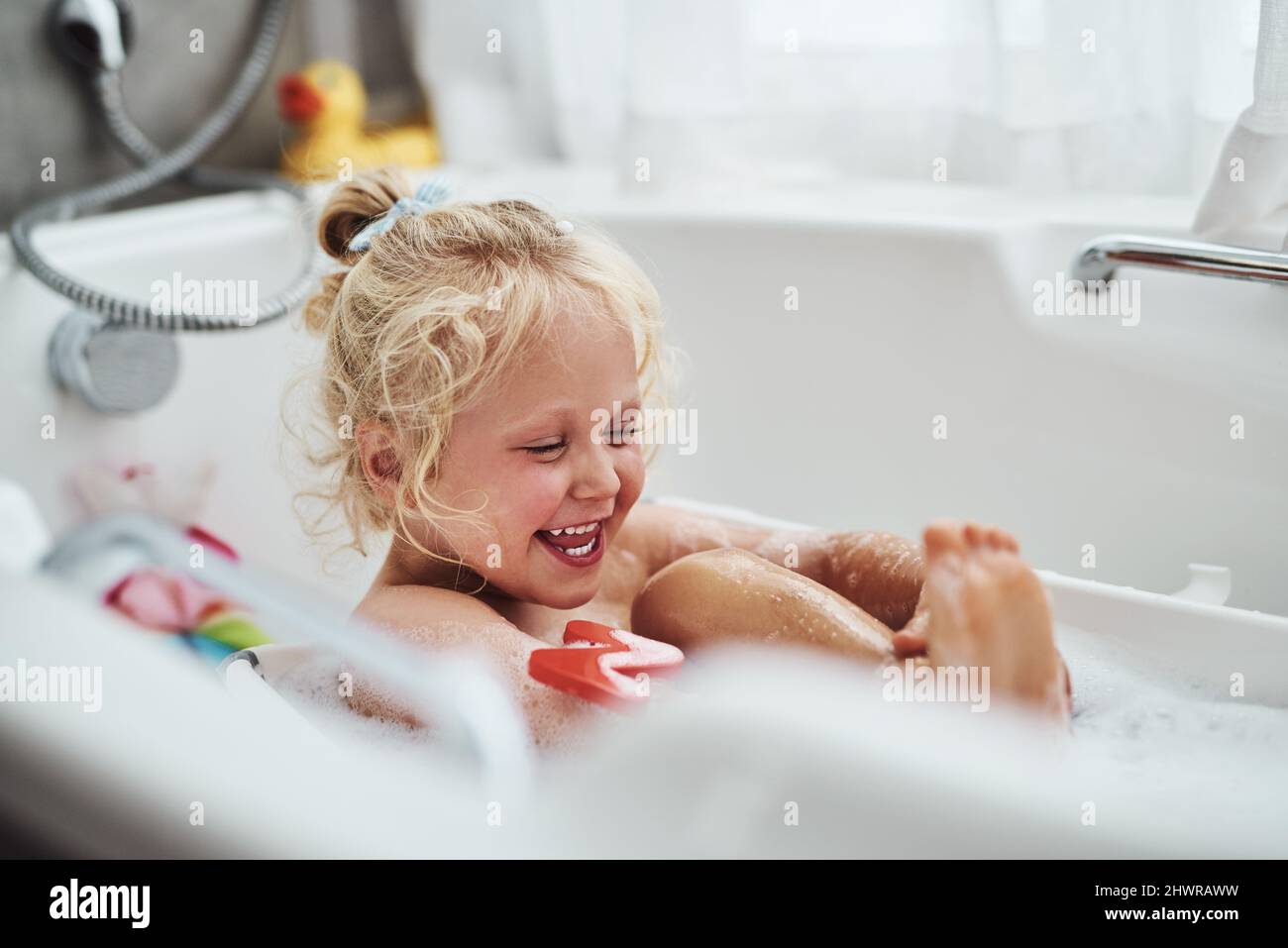 Bath time is my favourite time. Cropped shot of an adorable little girl