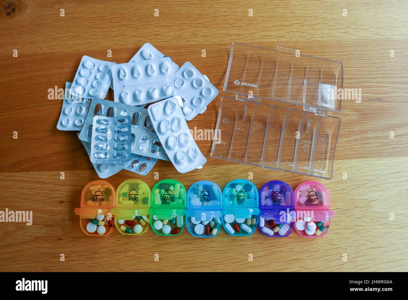 Pill Organisation, tablets and medication sorted in to a dosette box