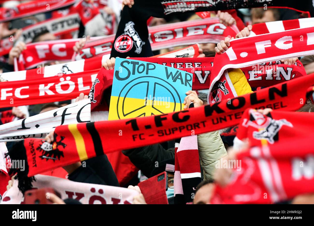 Bundesliga, Rhein Energie Stadium Cologne: 1. FC Köln vs Hoffenheim; 'Stop War' Cologne fans make a statement against the war in Ukraine. Stock Photo