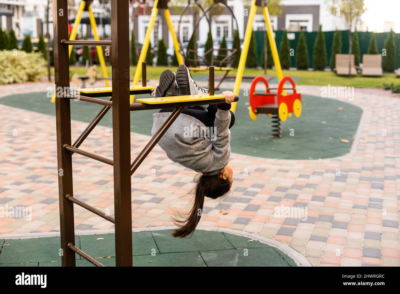 portrait of a little schoolgirl girl at the playground Stock Photo - Alamy
