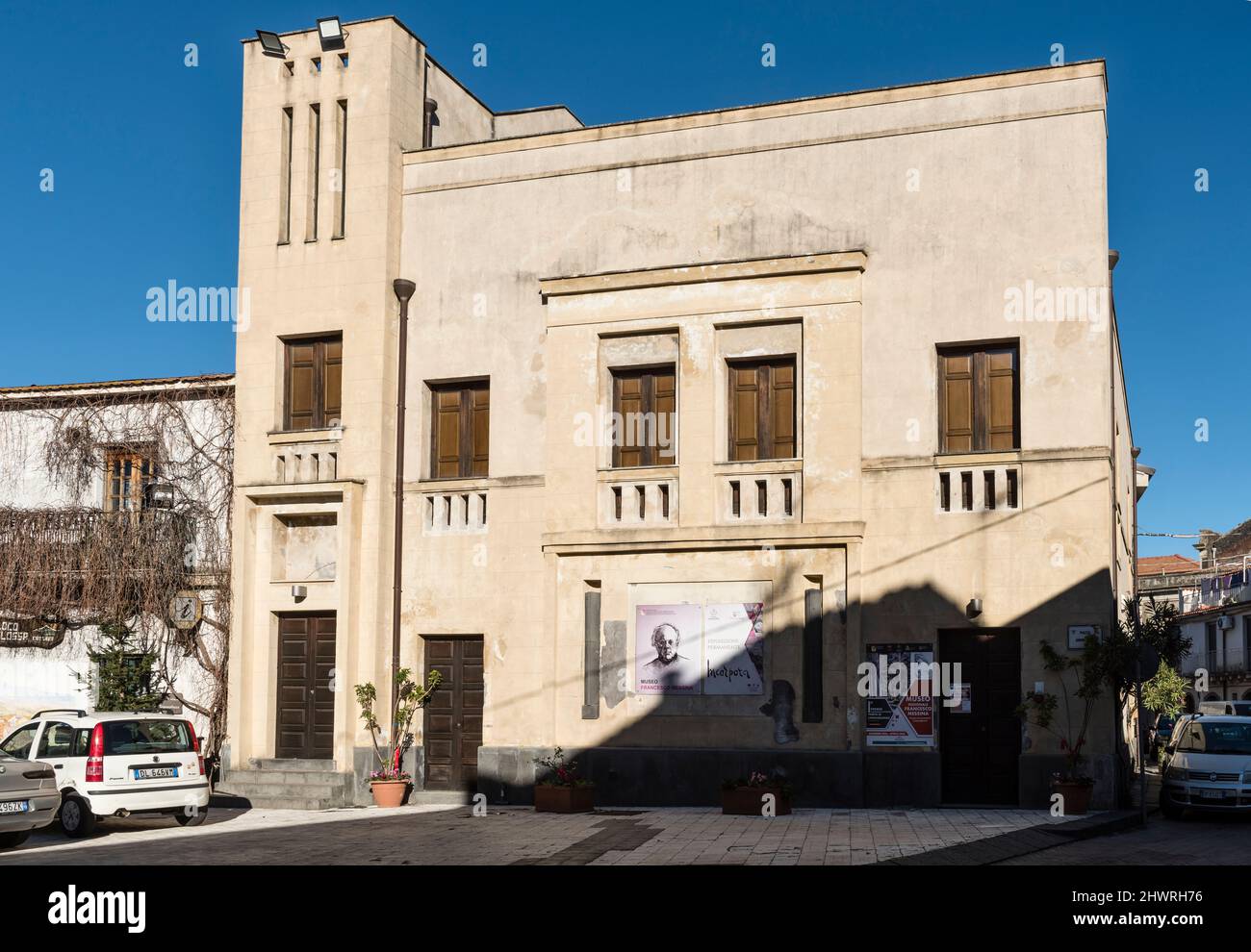 The old Casa del Fascio in Linguaglossa, Sicily, Italy. Such modernist 1930s buildings were designed to house the local branches of the Fascist Party Stock Photo