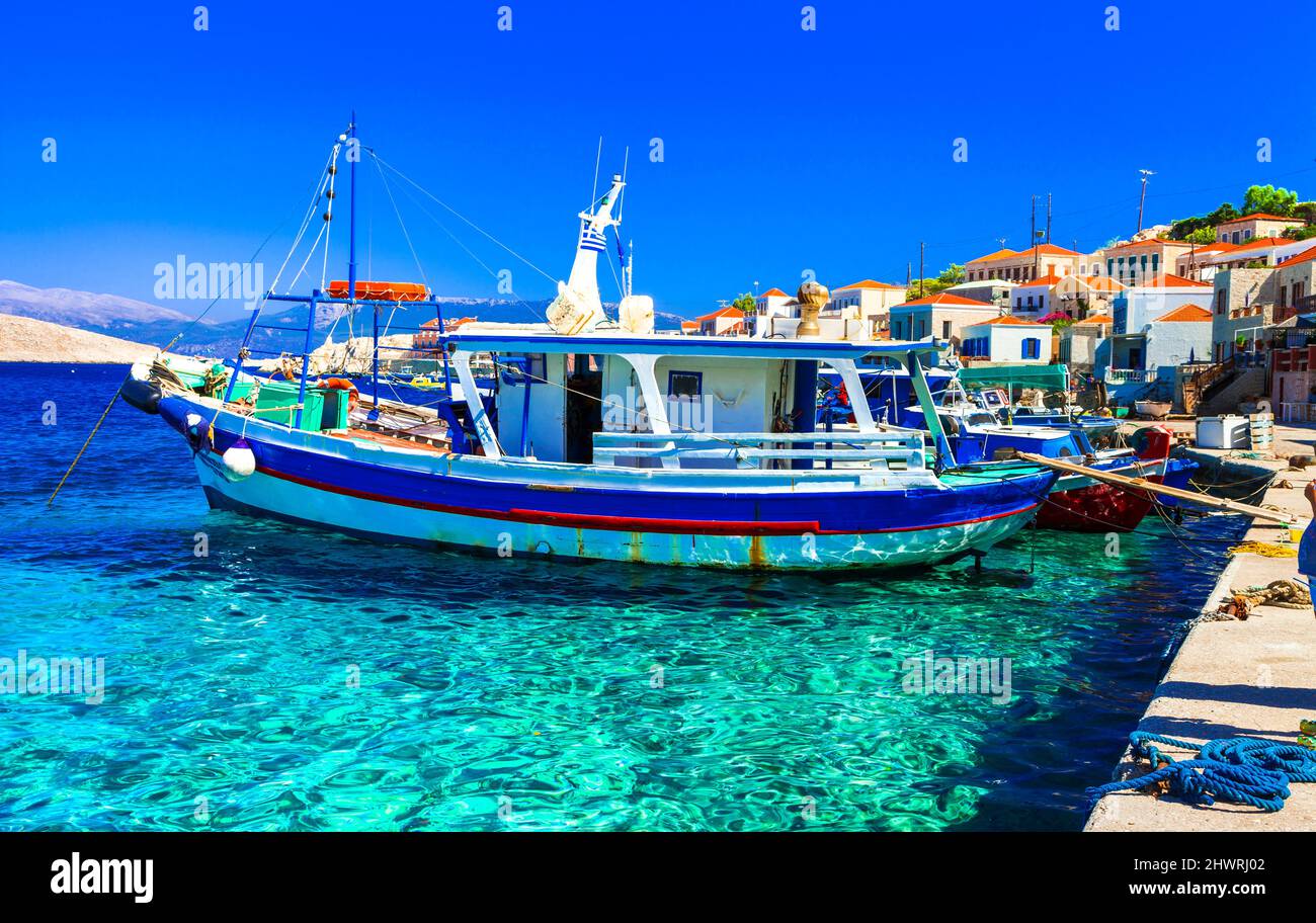Traditional Greece fishing villages - charming colorful Chalki (Halki) island in Dodecanese. view with typical boats Stock Photo