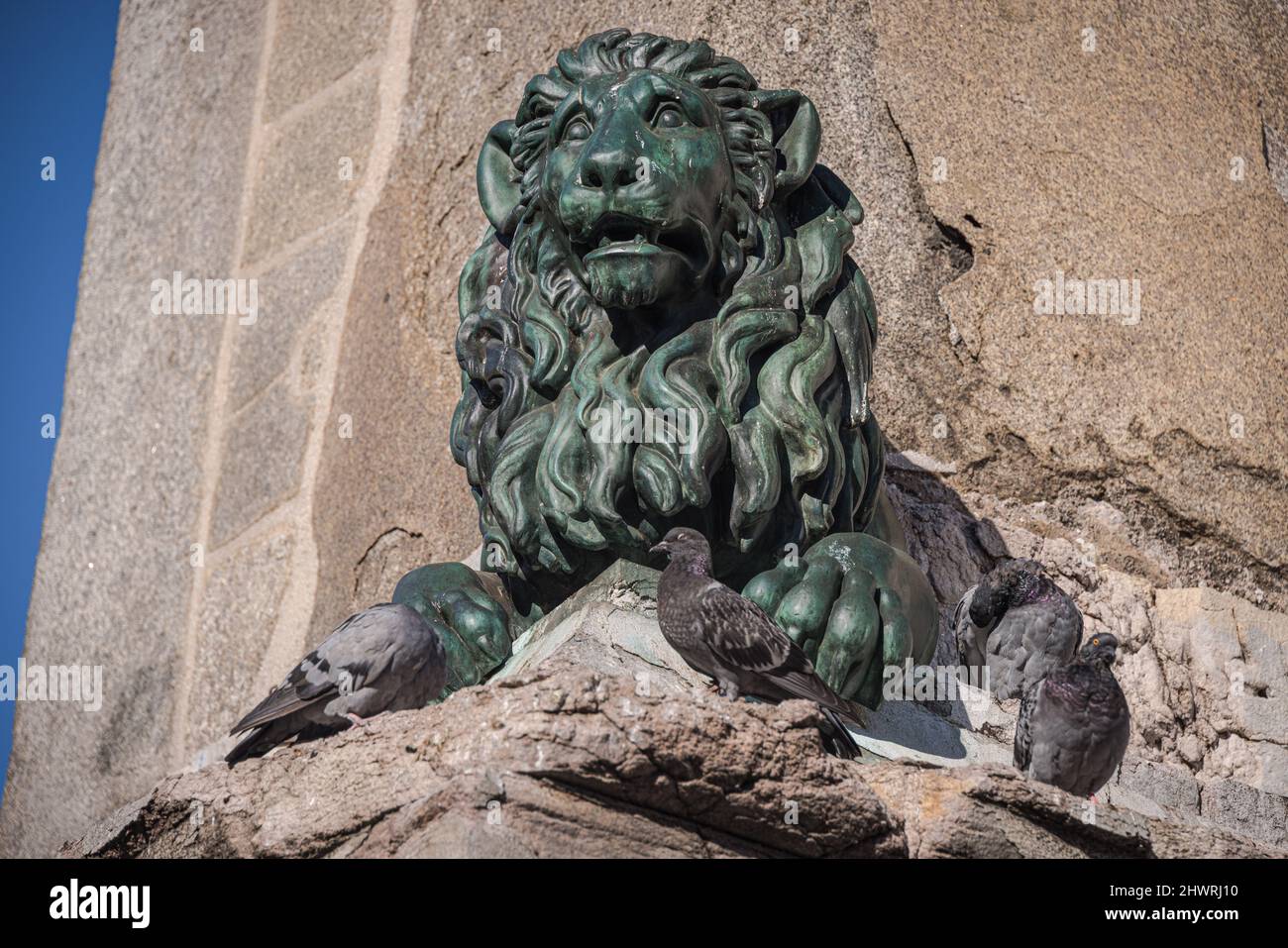 Lion sculpture on Arles Obelisk (Obelisque d'Arles), Arles, Provence, France Stock Photo