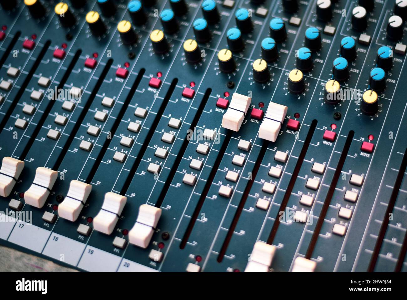 Sound engineer using mixing console to produce a sound track Stock ...