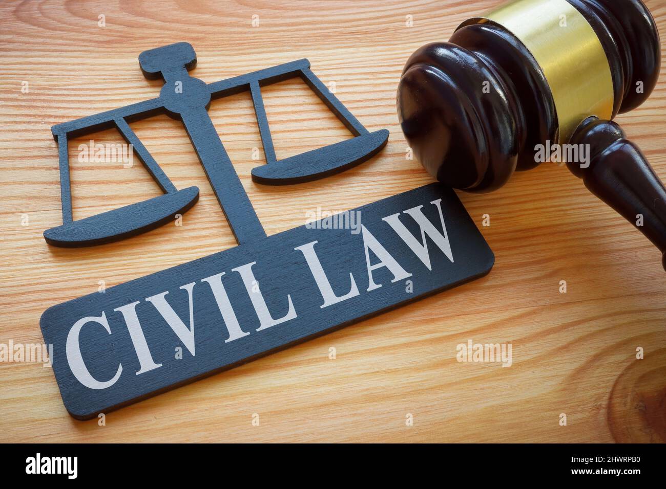 Plate with words Civil law and gavel. Stock Photo