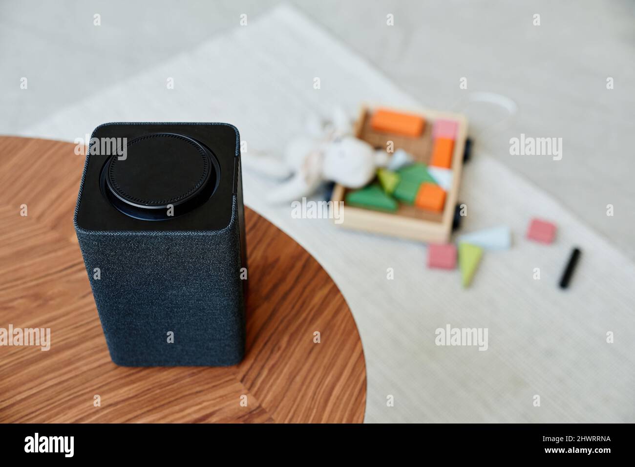 Top view close up of smart speaker in automated home environment with ...
