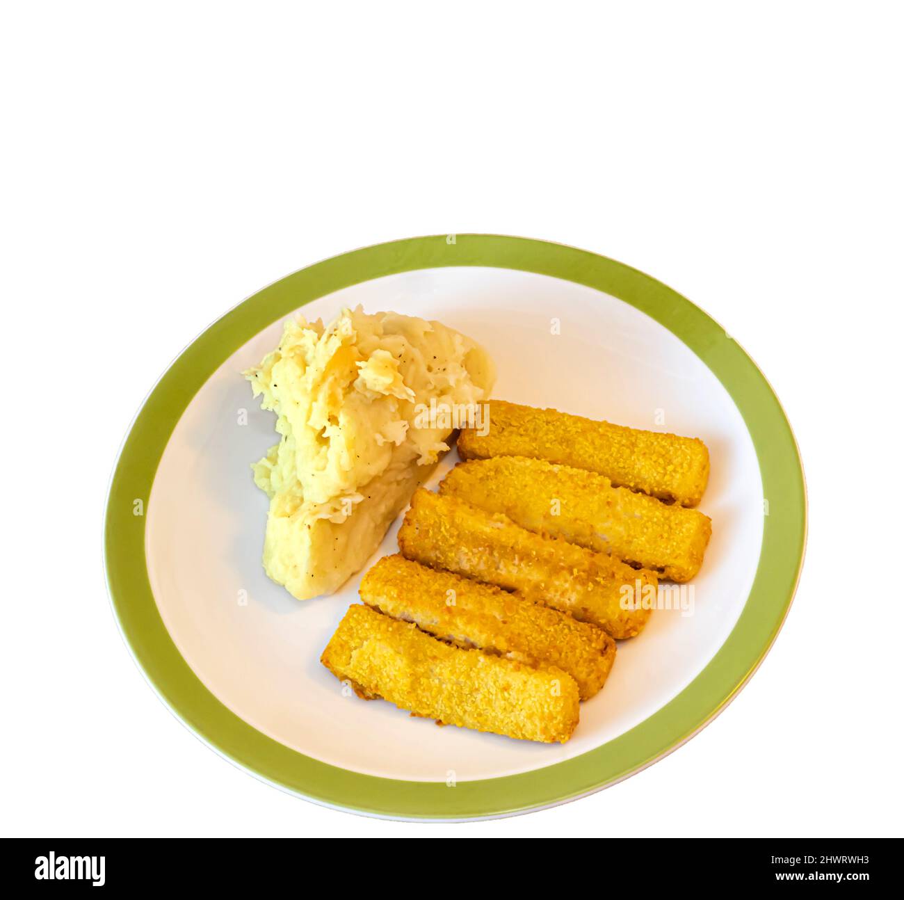 Five fish fingers and some mashed potato on a porcelain plate. Cutout