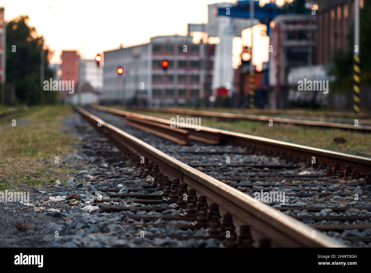 Railroad track at industrial area. Selective focus. Rail transportation. Railway in city Stock Photo