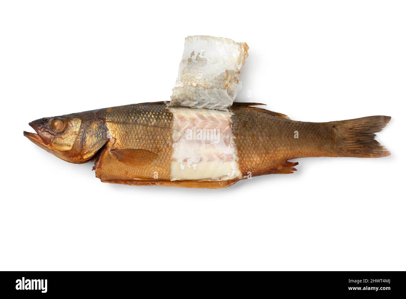 Single whole smoked sea bass with a piece of skin removed isolated on white background Stock Photo