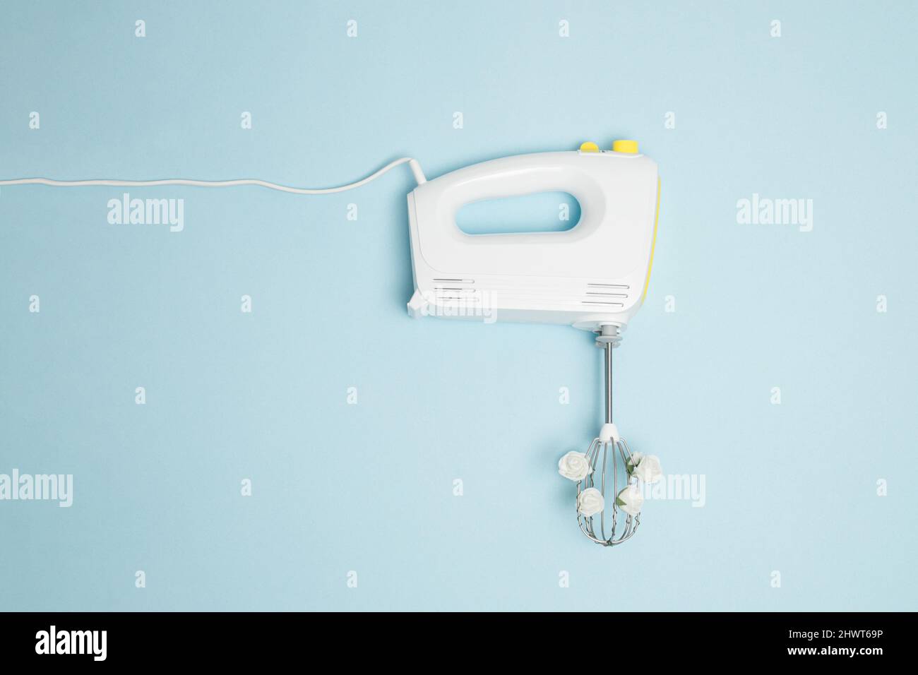 https://c8.alamy.com/comp/2HWT69P/creative-concept-made-of-white-electric-hand-mixer-with-beaters-and-white-rose-flowers-on-pastel-blue-background-household-kitchen-device-appliance-f-2HWT69P.jpg