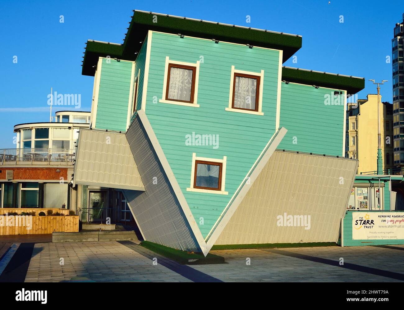 Upside down house on Brighton seafront Stock Photo