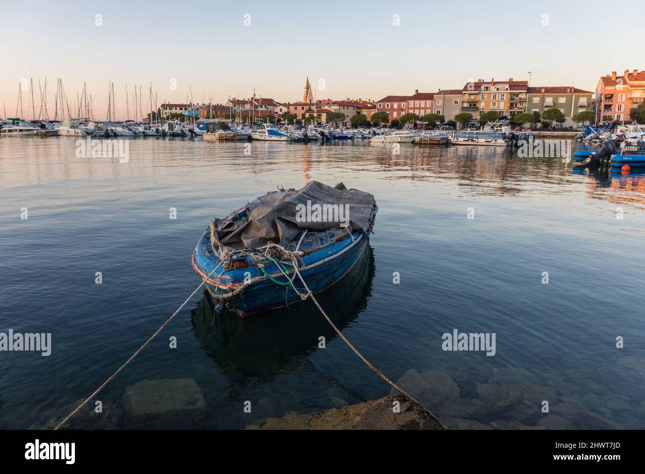 Boats moored in Izola town harbour, Slovenia Stock Photo