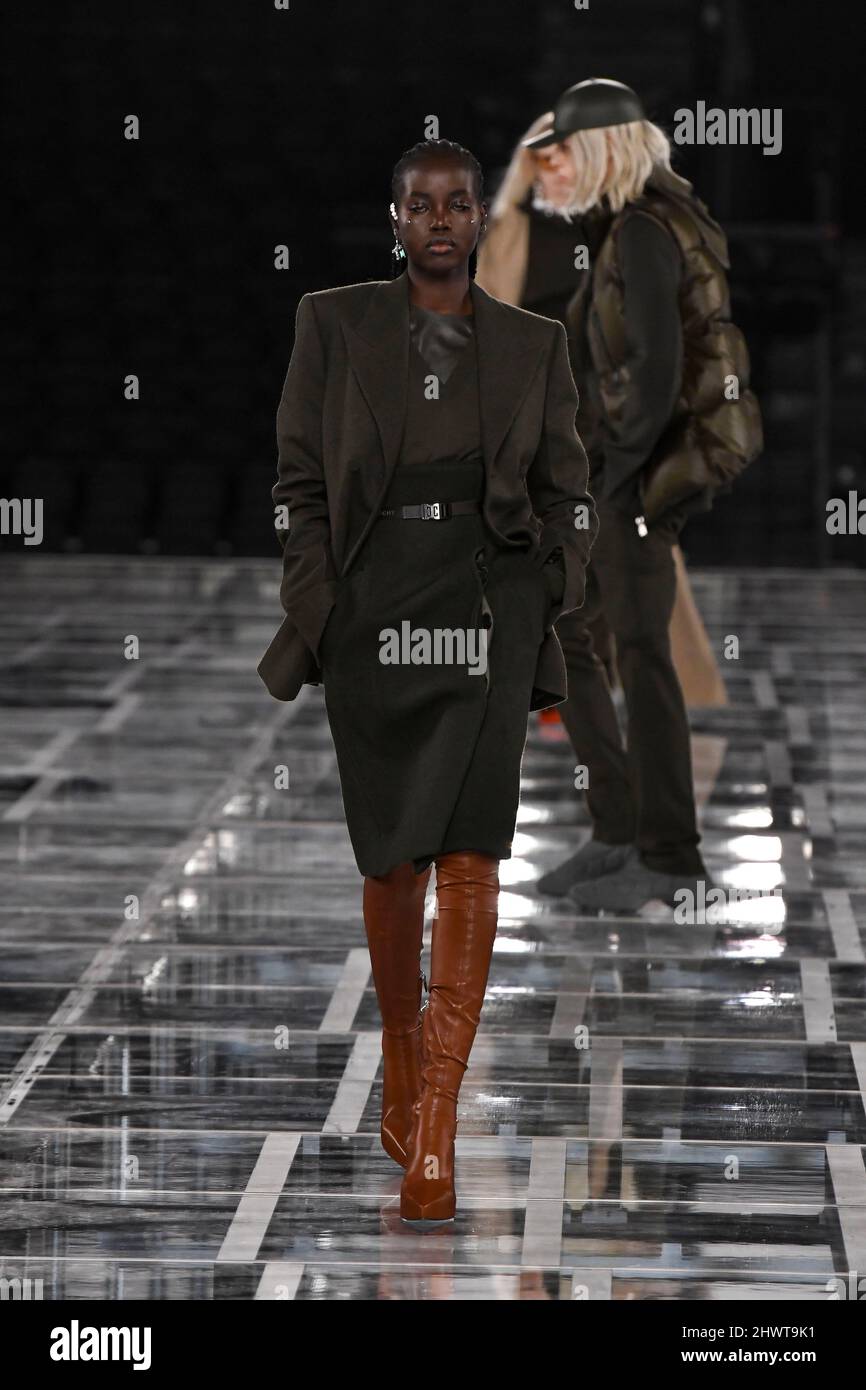 Model Adut Akech walks on the runway at the Givenchy fashion show ...