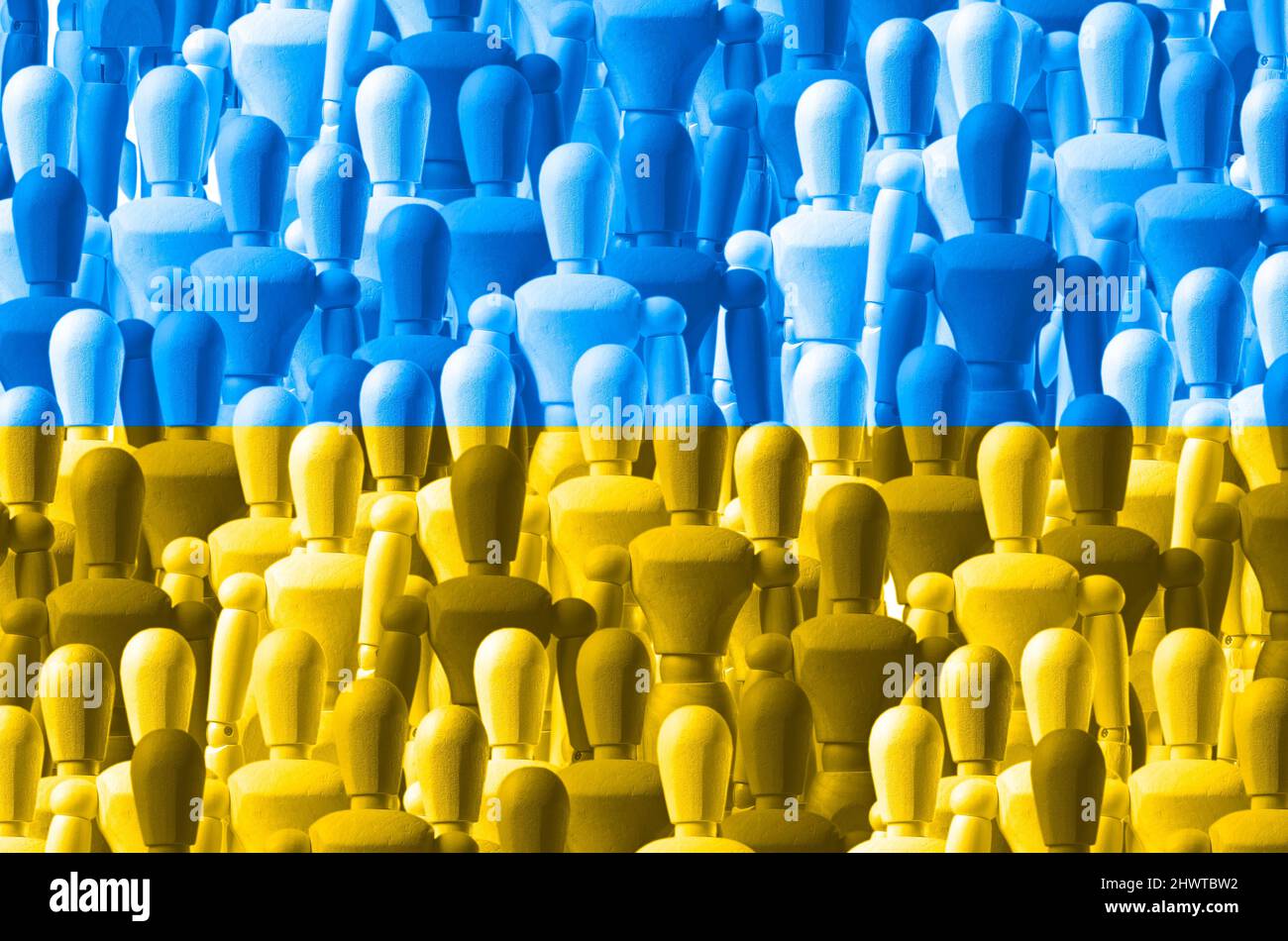 Ukrainian yellow and blue flag over people crowd. War conflict and protest for independence. Unity concept. High quality photo Stock Photo