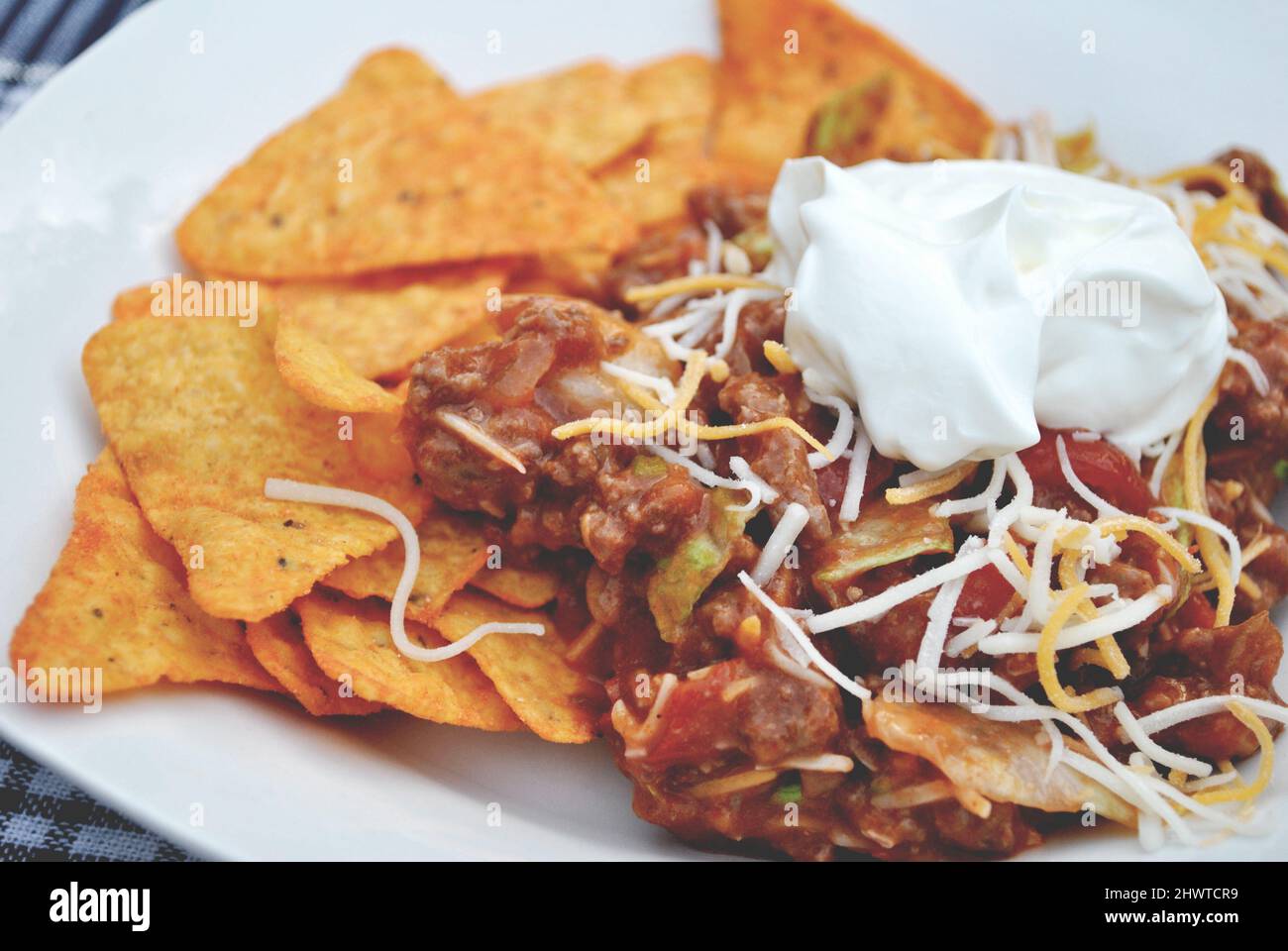 Dish of Taco Salad and Cheesy Chips Stock Photo Alamy