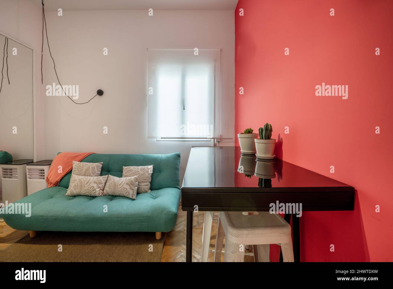 Sofa that can be converted into a bed. "You can stay tonight to sleep