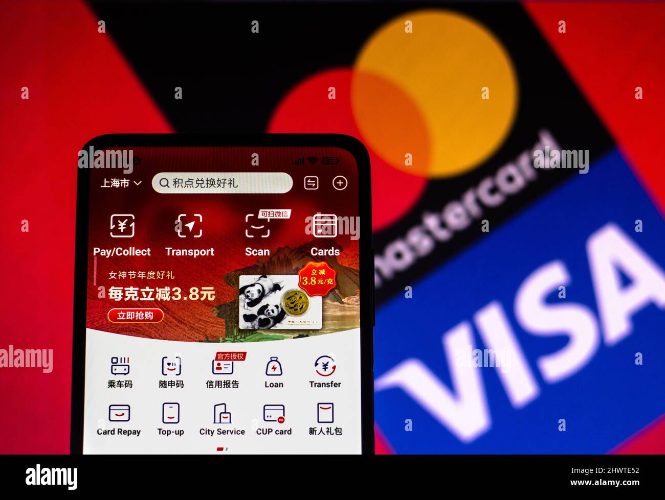 In this photo illustration, the UnionPay (CUP) app seen displayed on a  smartphone screen with the Visa and Mastercard logos in the background.  (Photo by Rafael Henrique / SOPA Images/Sipa USA Stock