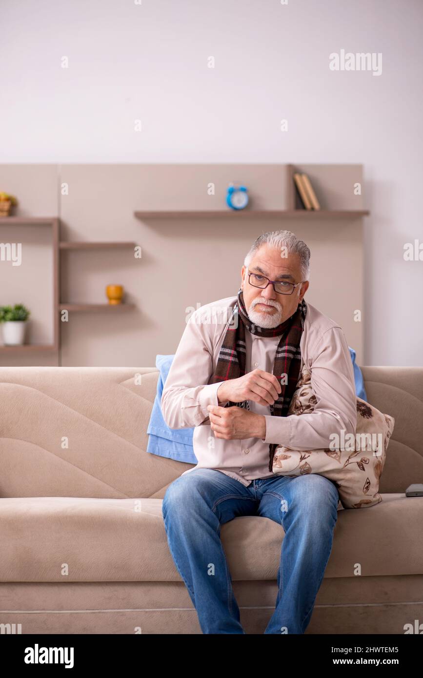 Sick old man coughing sitting hi-res stock photography and images - Alamy