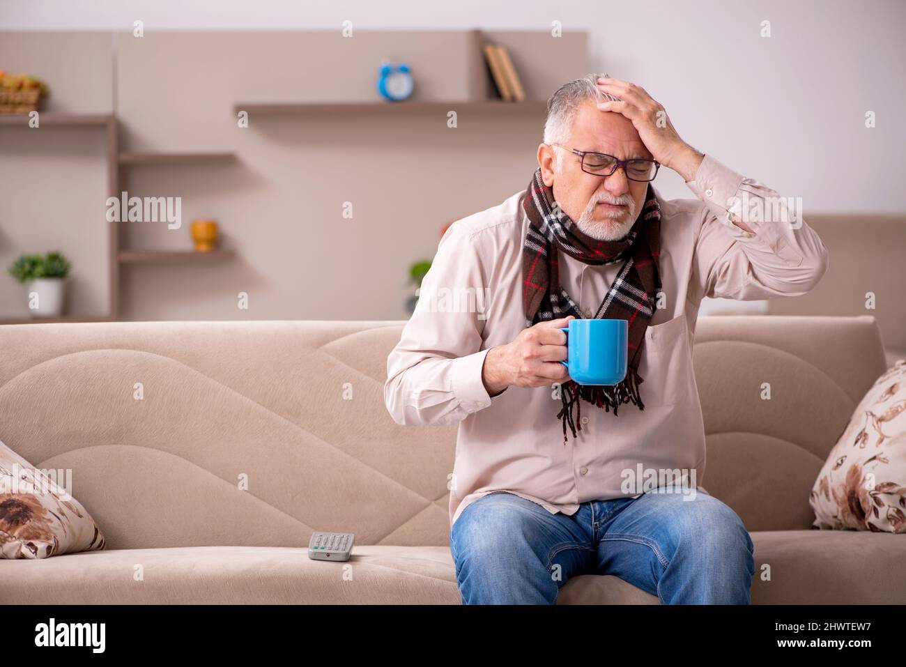 Sick old man coughing sitting hi-res stock photography and images - Alamy