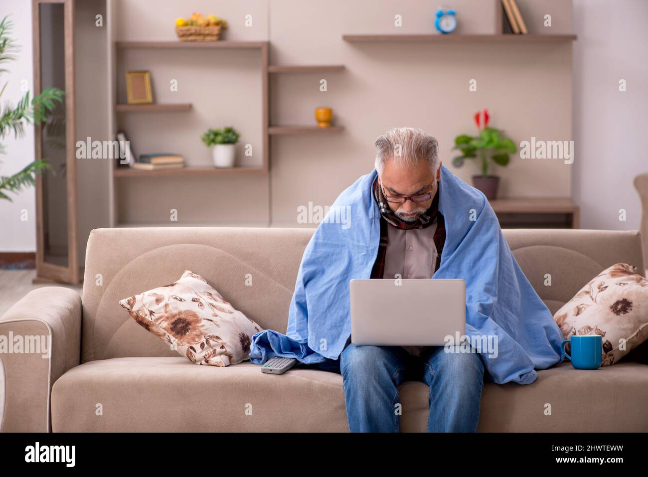 Sick old man coughing sitting hi-res stock photography and images - Alamy