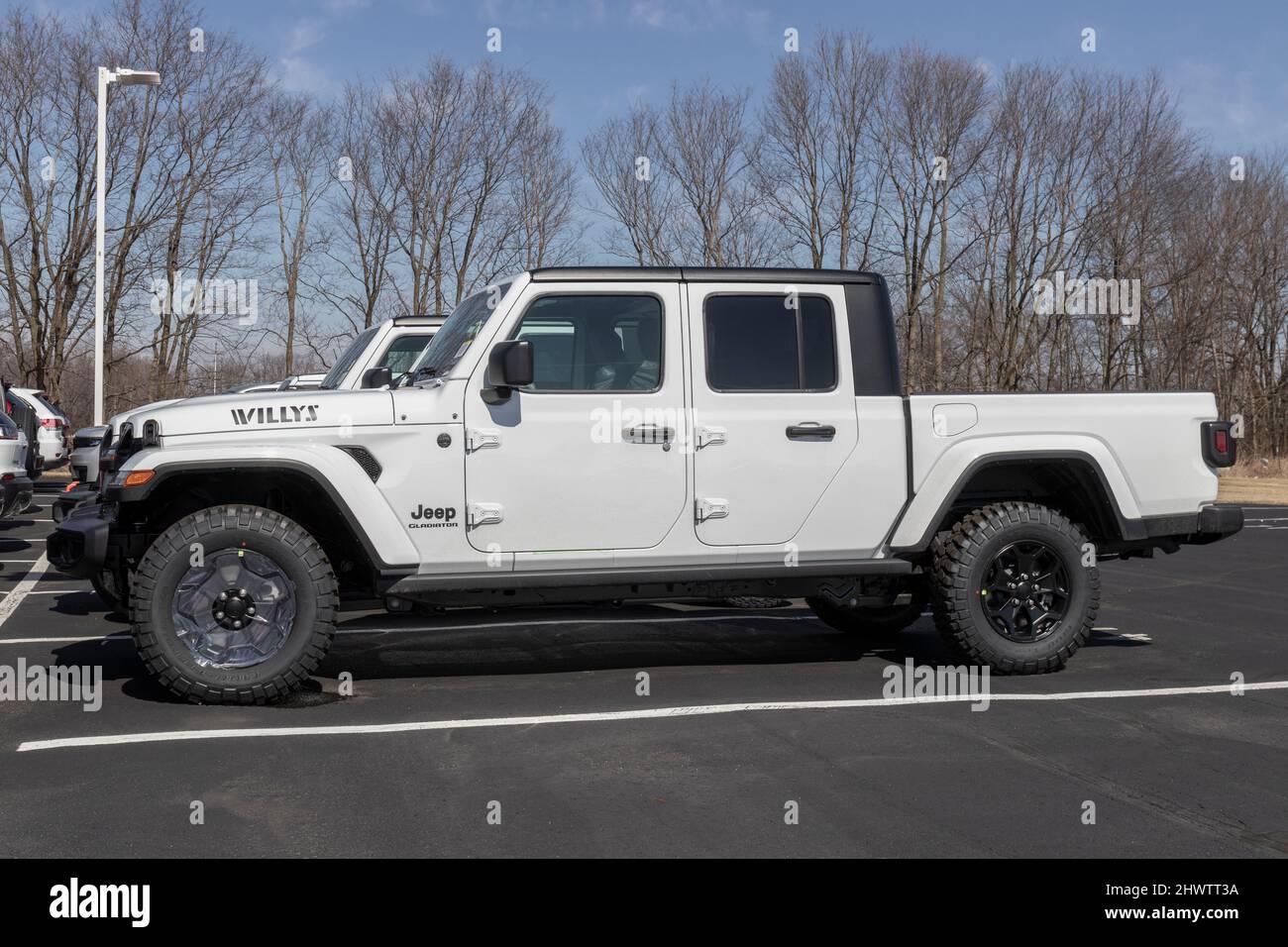 Kokomo - Circa March 2022: Jeep Gladiator display at a Stellantis dealer. The Jeep Gladiator models include the Sport, Willys, Rubicon and Mojave. Stock Photo
