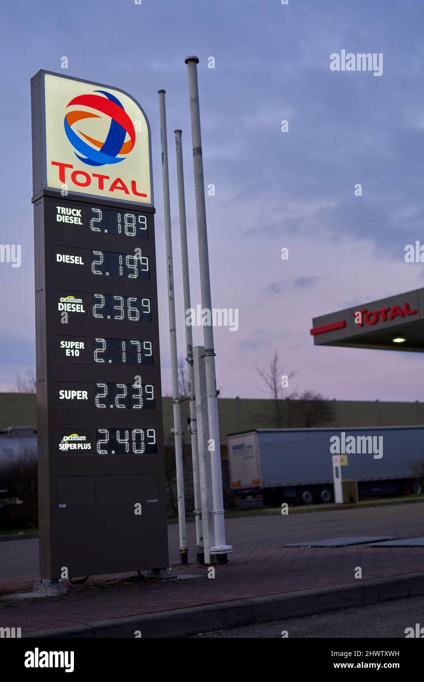 Denkendorf, Germany - March 07, 2022: Price board with highest gasoline, diesel and fuel prices. Most expensive gas and oil prices at German Total gas Stock Photo