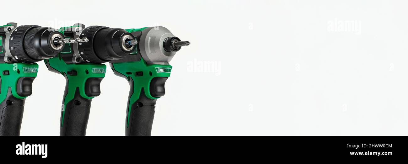 Drill. Set of cordless drills on a white background. Tool for drilling and making holes