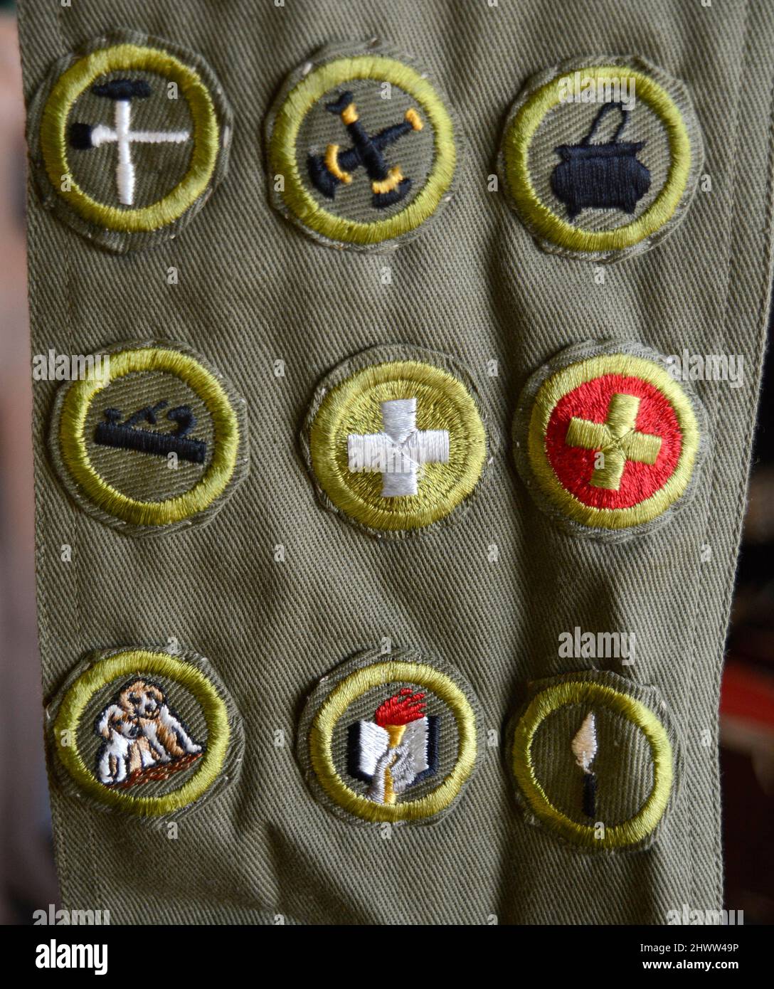 A selection of vintage Cub Scout merit badges on a sash for sale in an antique shop in Santa Fe, New Mexico. Stock Photo