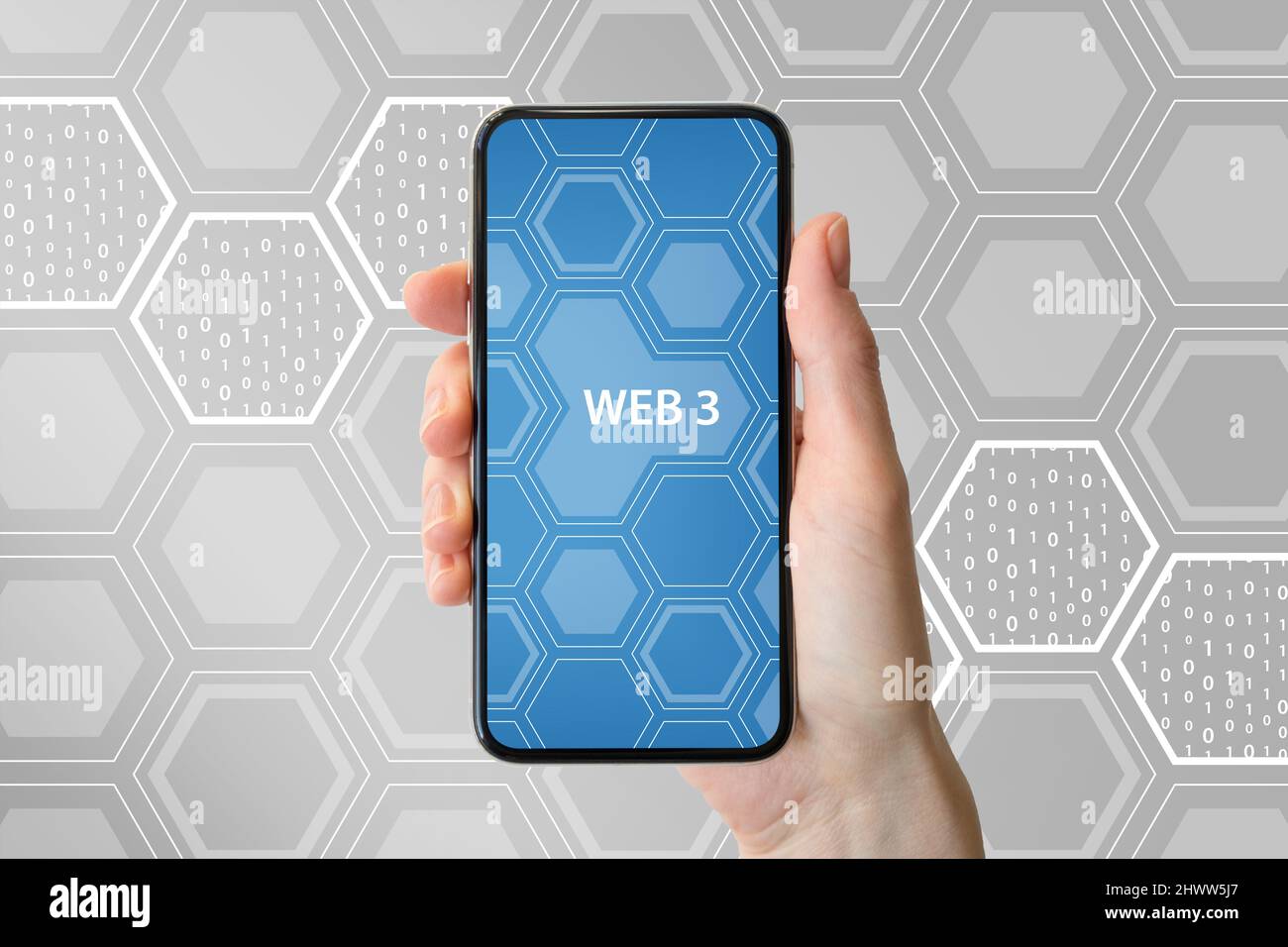 Web 3 or Web 3.0 concept. Hand holding next generation smart phone. Stock Photo