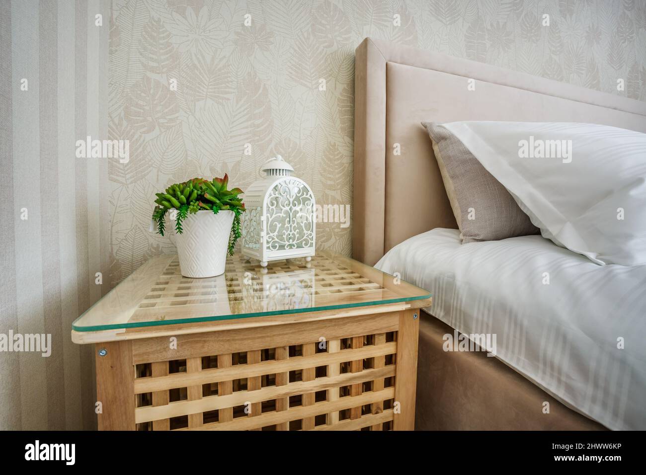 Interior of the modern luxure bedroom with pillows on the bed in studio