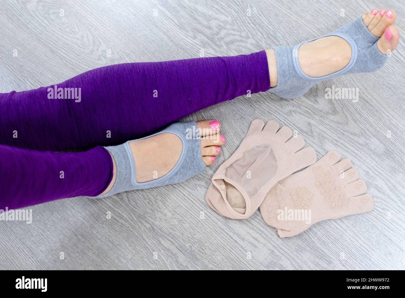 Woman Wearing Purple Leggings Showing Her Amazing Result Stock