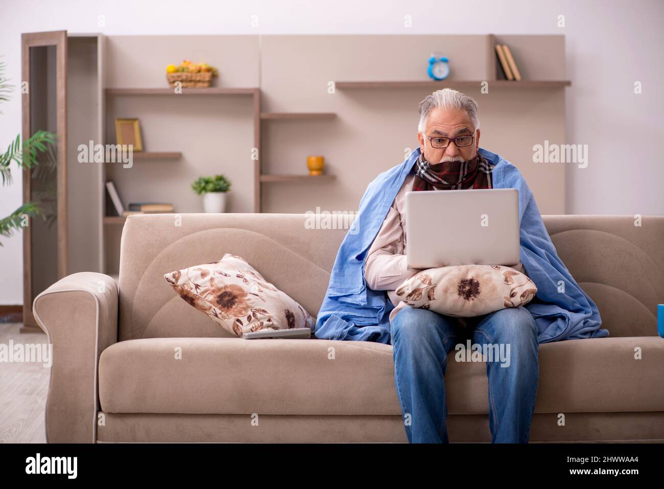 Sick old man coughing sitting hi-res stock photography and images - Alamy