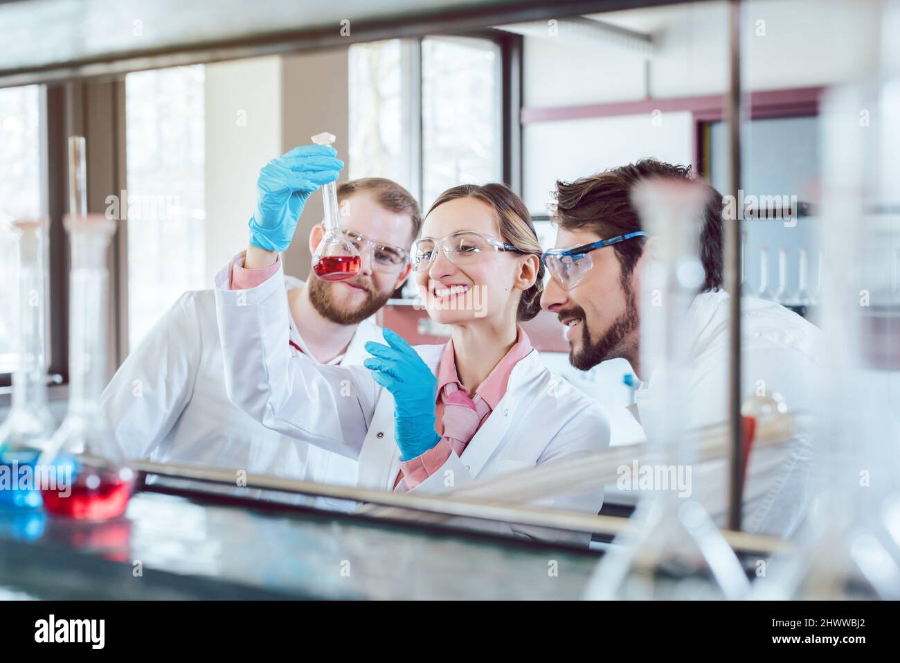 Scientific Chemists synthesizing a new compound Stock Photo